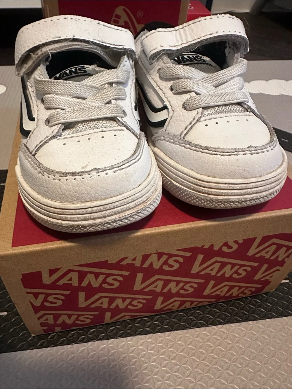 Vans Kids White Sneakers with Black Stripe